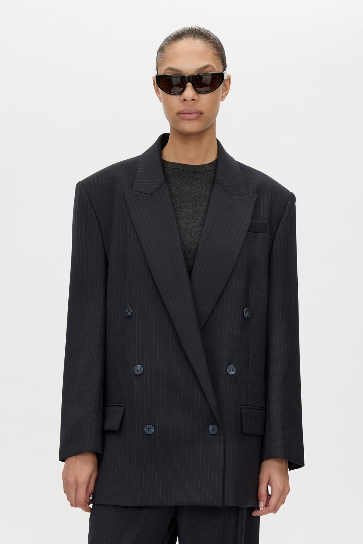Cropped view CAMILLA AND MARC Orban Oversized Blazer in Navy Pinstripe with double‑breasted closure.