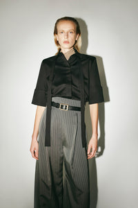 Styled view CAMILLA AND MARC Pique Short Sleeve Shirt in Black with a boxy silhouette and French‑cuff sleeves.