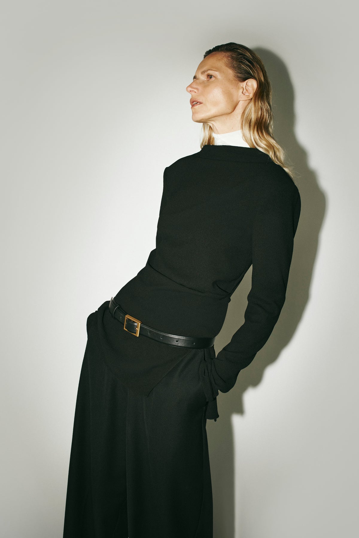 Styled view CAMILLA AND MARC Eon Long Sleeve Top in Black with a draped back neckline.