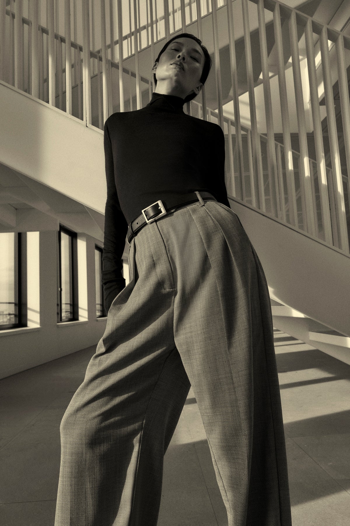 Styling view CAMILLA AND MARC Ren Pant in Charcoal Herringbone with a double‑pleat wide‑leg silhouette.