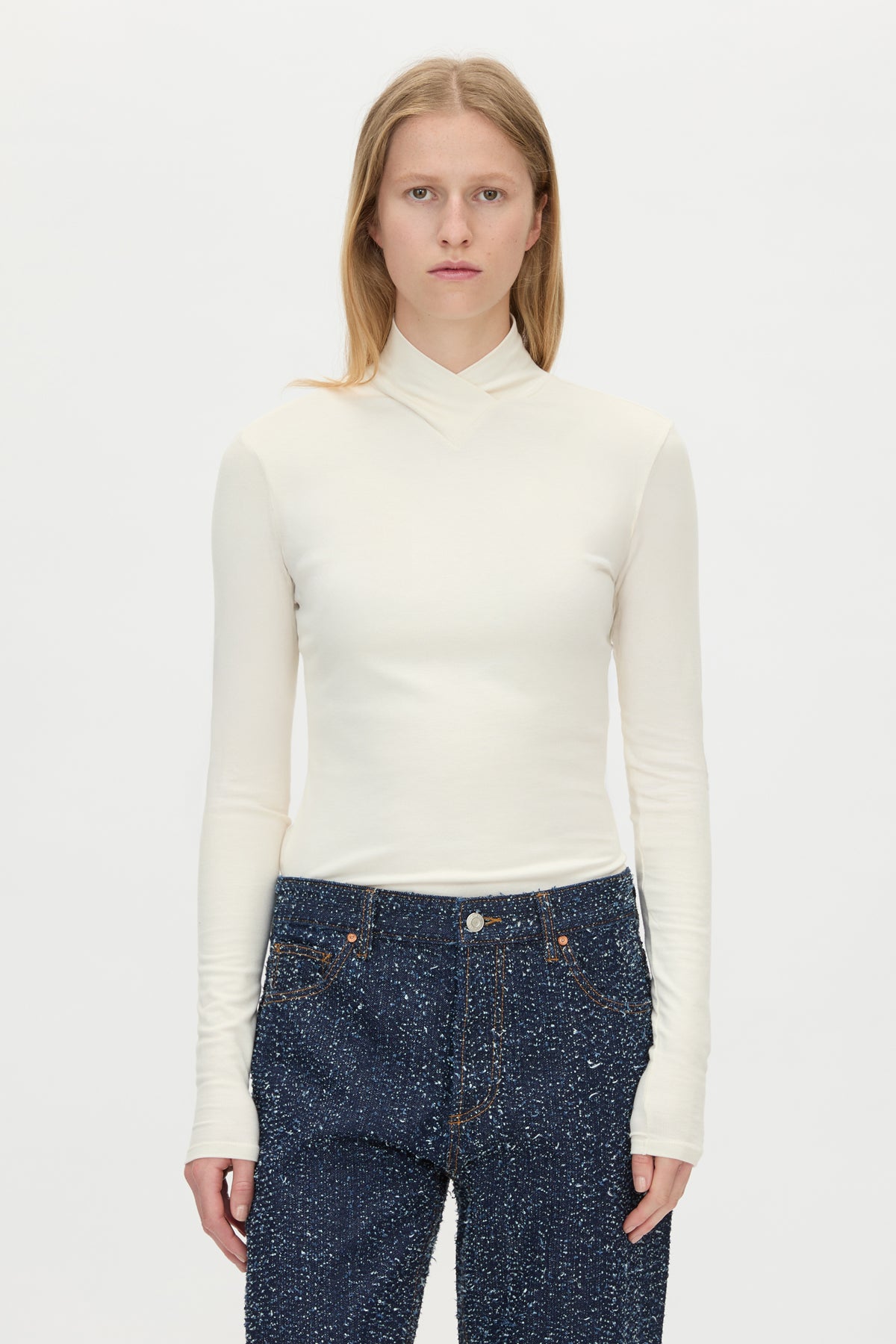Cropped view CAMILLA AND MARC Axial Top in Cream with layered cross‑over high neck.