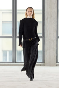 Runway view CAMILLA AND MARC Eon Long Sleeve Top in Black with a draped back neckline.