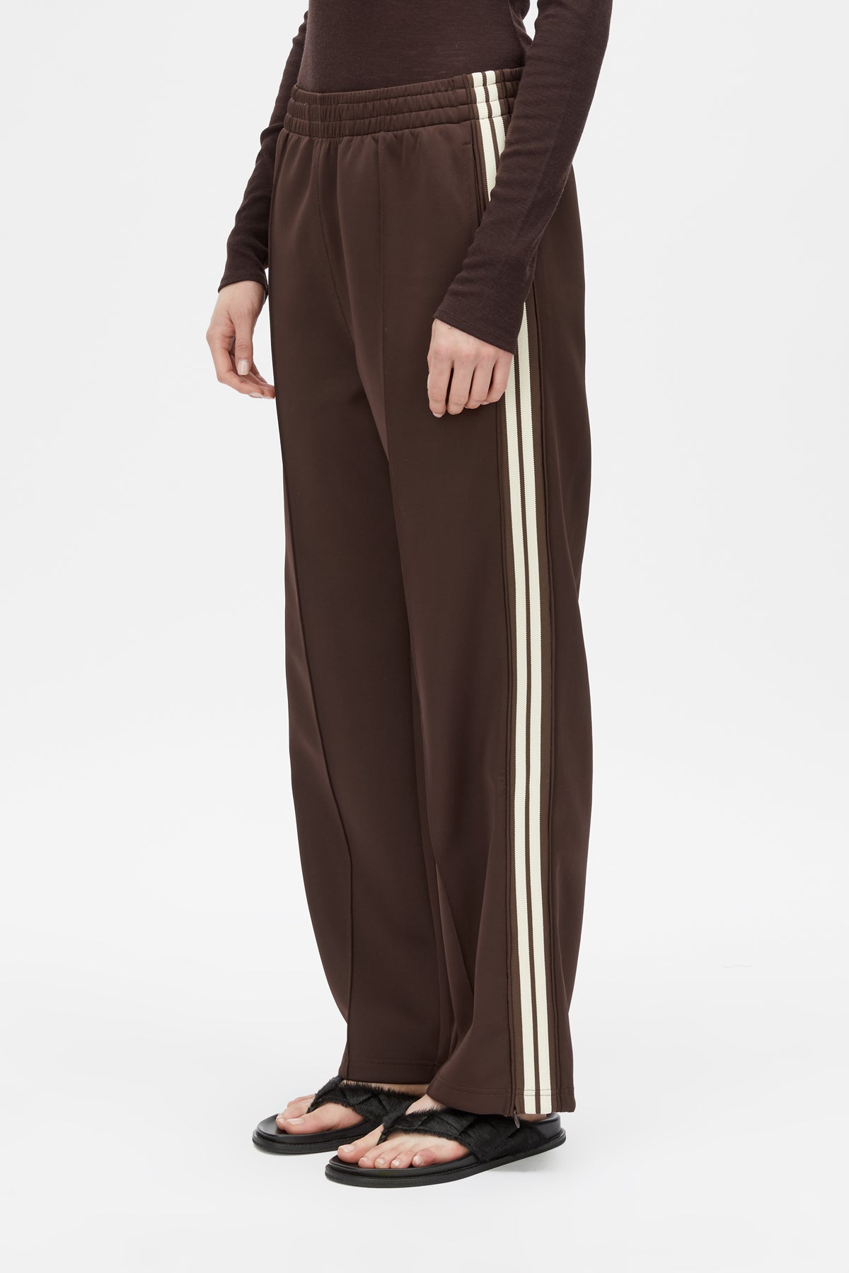Cropped view CAMILLA AND MARC Locus Scuba Pant in Espresso with a mid‑rise fit and side‑stripe tape.