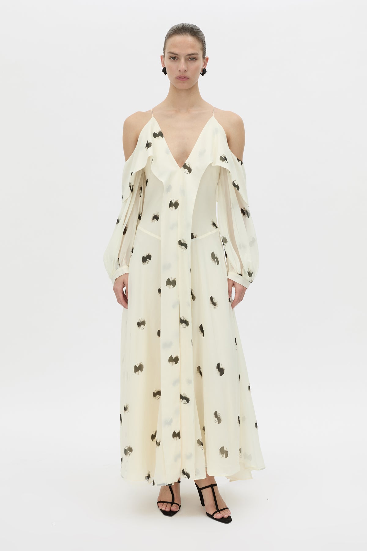 Front-styled view CAMILLA AND MARC Adel Long Sleeve Maxi Dress with adjustable straps and exposed shoulder sleeves.