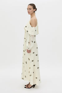 Side view CAMILLA AND MARC Adel Long Sleeve Maxi Dress with adjustable straps and exposed shoulder sleeves.