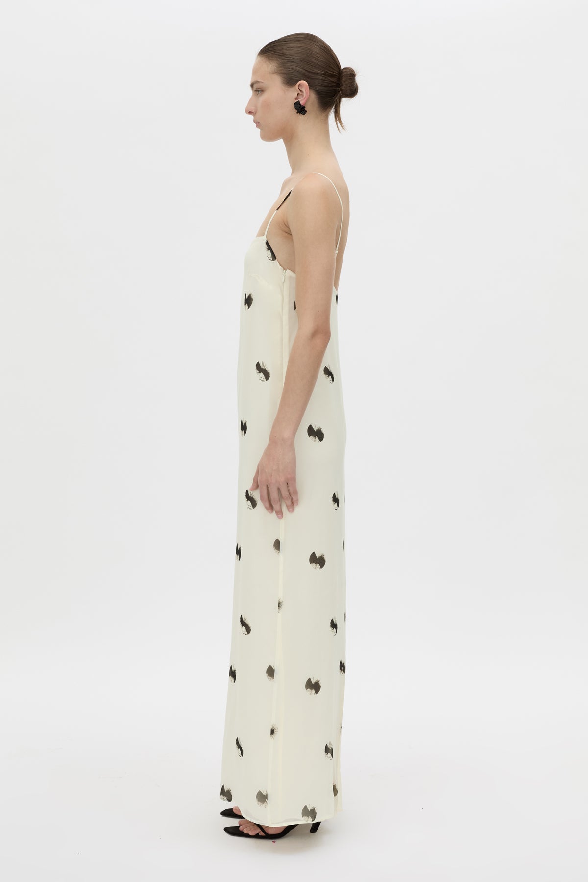 Side view CAMILLA AND MARC Adel Maxi Slip Dress with straight neckline and adjustable straps.
