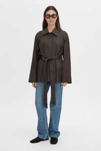 Front-styled view CAMILLA AND MARC Aidra Short Trench Coat in hickory with twin-needle stitch detail.