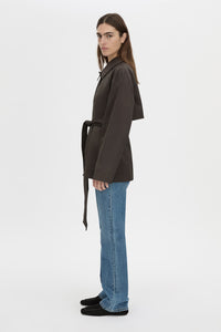Side view CAMILLA AND MARC Aidra Short Trench Coat in hickory with twin-needle stitch detail.