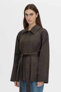 Cropped view CAMILLA AND MARC Aidra Short Trench Coat in hickory with twin-needle stitch detail.