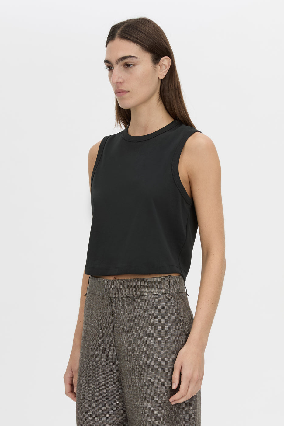 Cropped view CAMILLA AND MARC Alba Crop Rib Tank in black with bound low armholes and neckline.