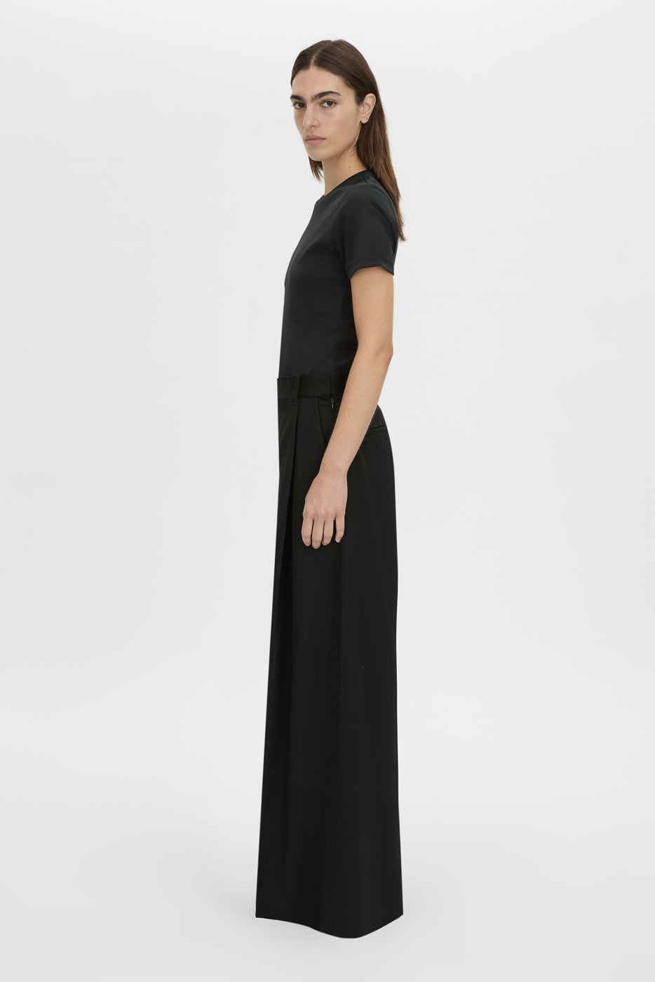 Side view CAMILLA AND MARC Alba cotton rib fitted tee in black with self-rib bind at the neck, narrow twin needle finish, designed to fade.