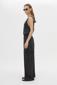 Side view CAMILLA AND MARC Allegro Satin Pant in Washed Black with mid‑rise cargo fit.