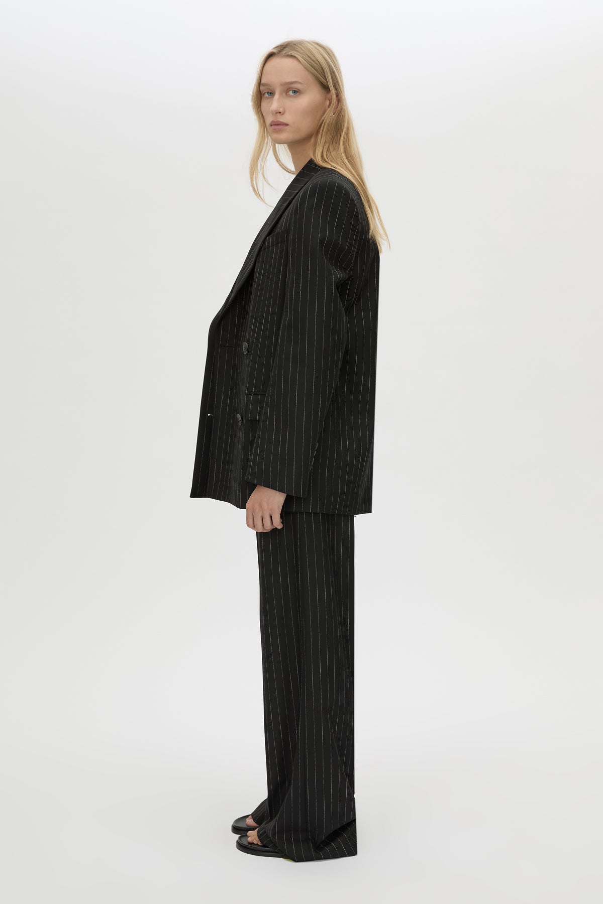 Side view CAMILLA AND MARC Alvar Double Breasted Blazer in black and white stripe.