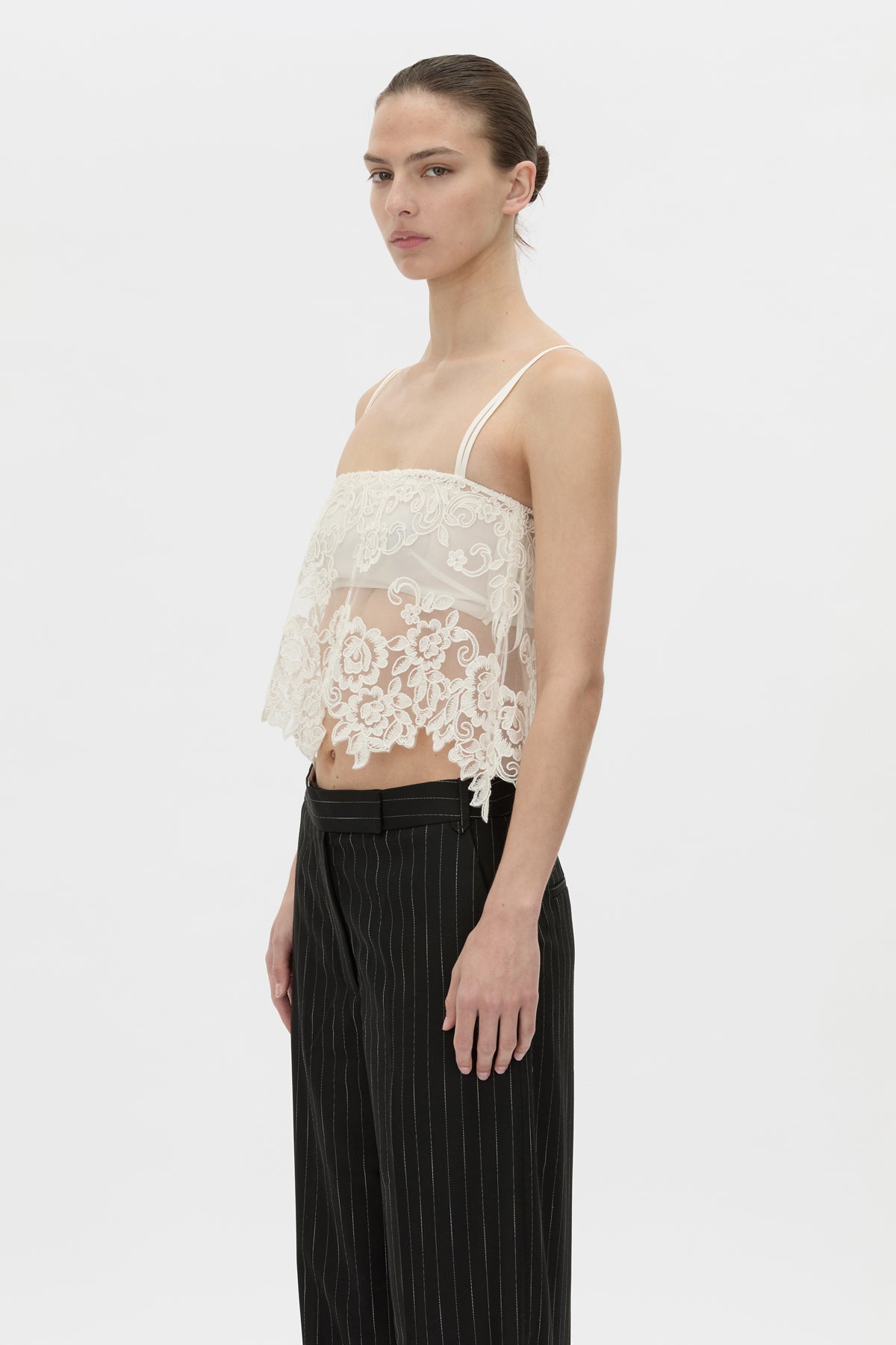 Cropped view CAMILLA AND MARC sheer Alvar Lace Cami in cream with adjustable elastic straps.