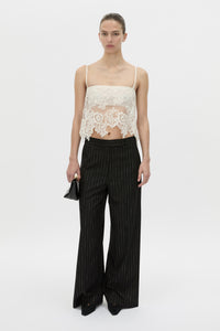 Front view CAMILLA AND MARC sheer Alvar Lace Cami in cream with adjustable elastic straps.