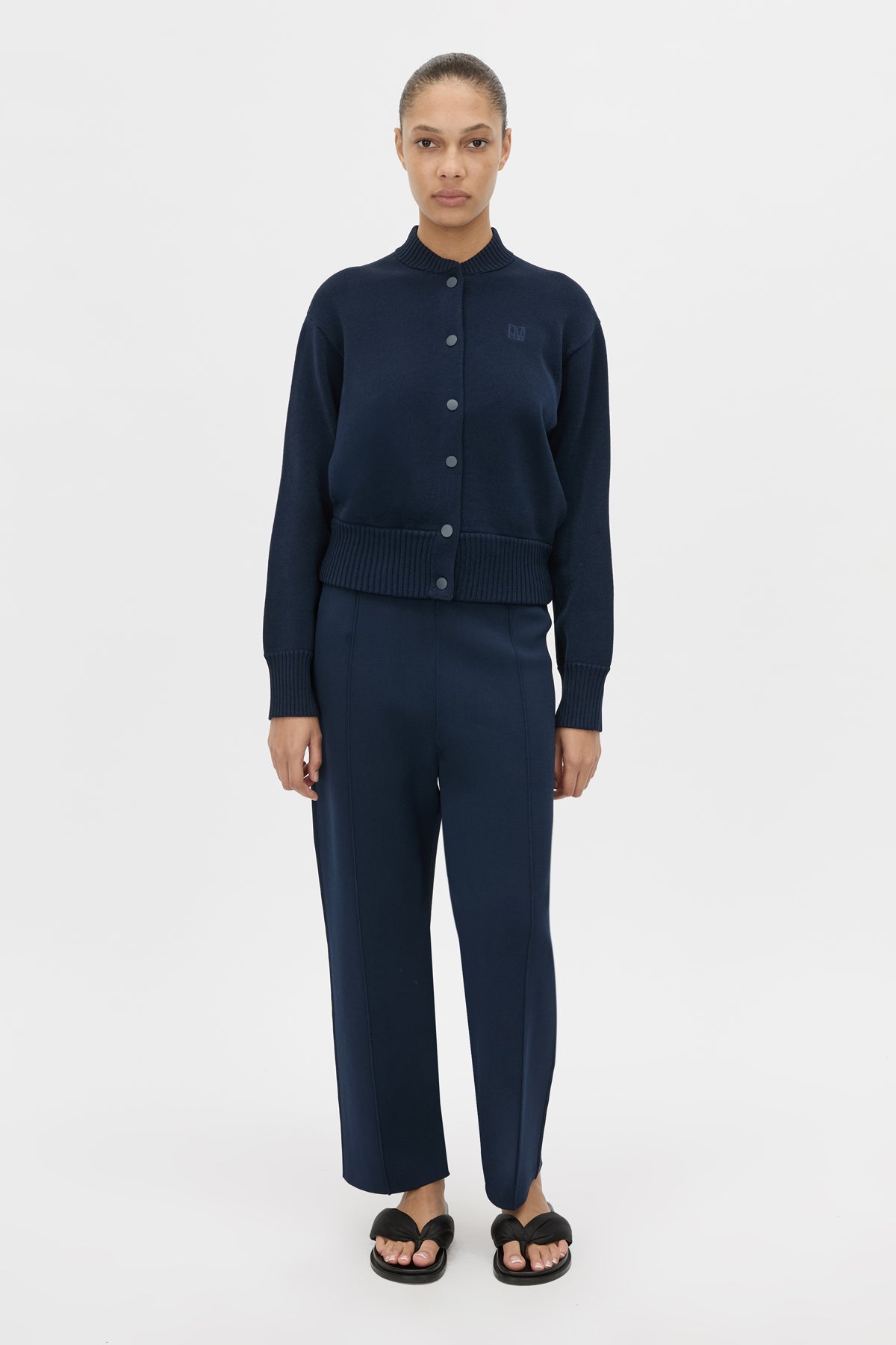 Front-styled view CAMILLA AND MARC straight leg Amedeo Knit Pant in dark navy.