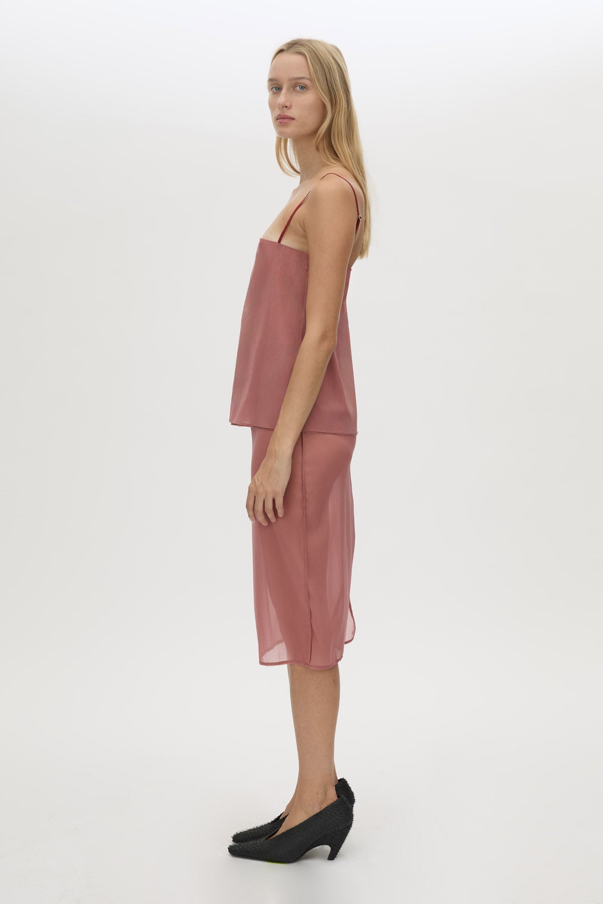 Side view CAMILLA AND MARC Arabella Midi Skirt in sheer dusty rose with detachable jersey brief and jersey mini skirt.