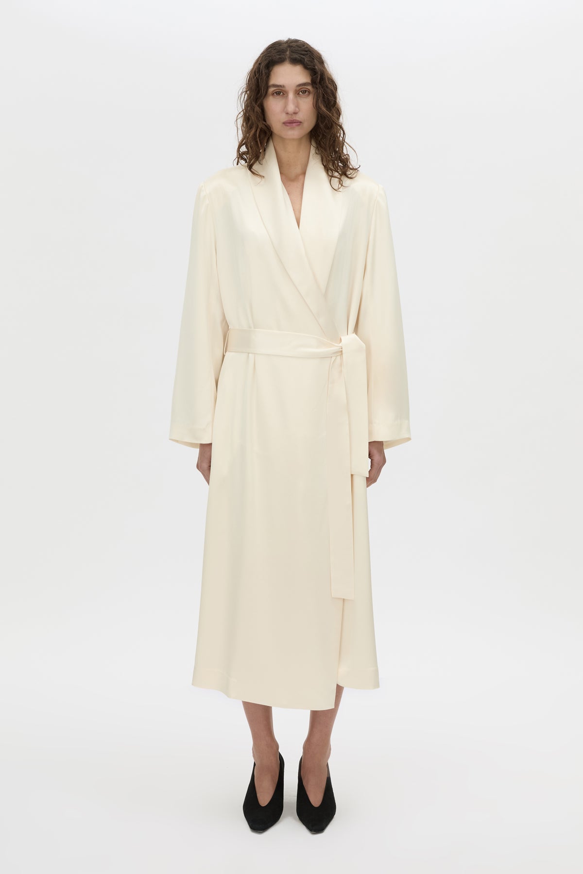 Front-styled view CAMILLA AND MARC Arion Shawl Collar Dress in cream with wrapped robe-style design.