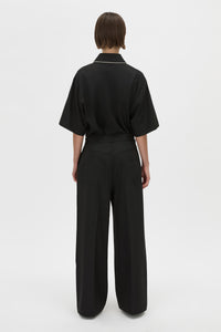 Back View - CAMILLA AND MARC Atticus Pant in black with a low-rise, wide leg silhouette. 