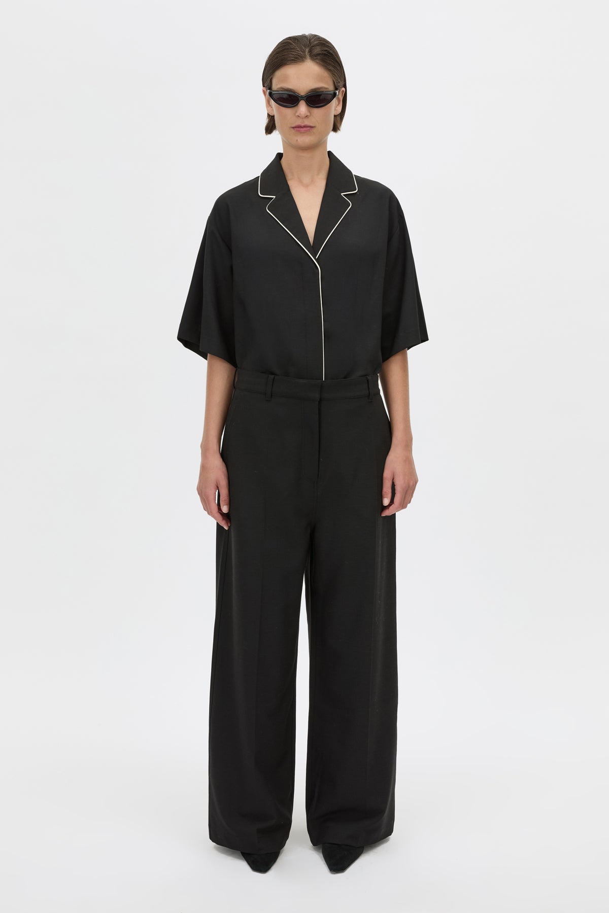 Styled View - CAMILLA AND MARC collared Atticus Short Sleeve Shirt in black with contrast cord piping. 