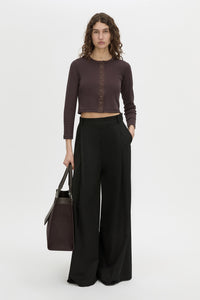 Front-styled view CAMILLA AND MARC Aubrey Long Sleeve Rib Top in hickory with a contrast corozo button placket.