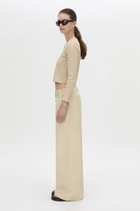 Side view CAMILLA AND MARC Aubrey Long Sleeve Rib Top in Latte with a contrast corozo button placket.