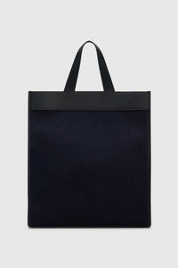 Back view CAMILLA AND MARC August Tote Bag in navy with black trim in cotton-linen canvas.