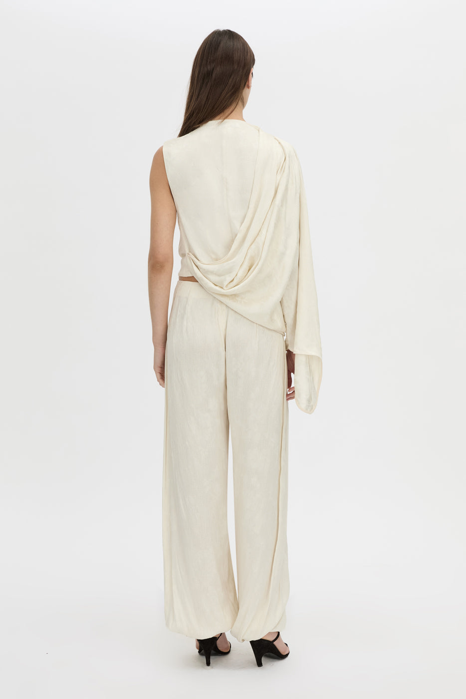 Back view CAMILLA AND MARC Avis Pant in cream with wide-leg balloon design.