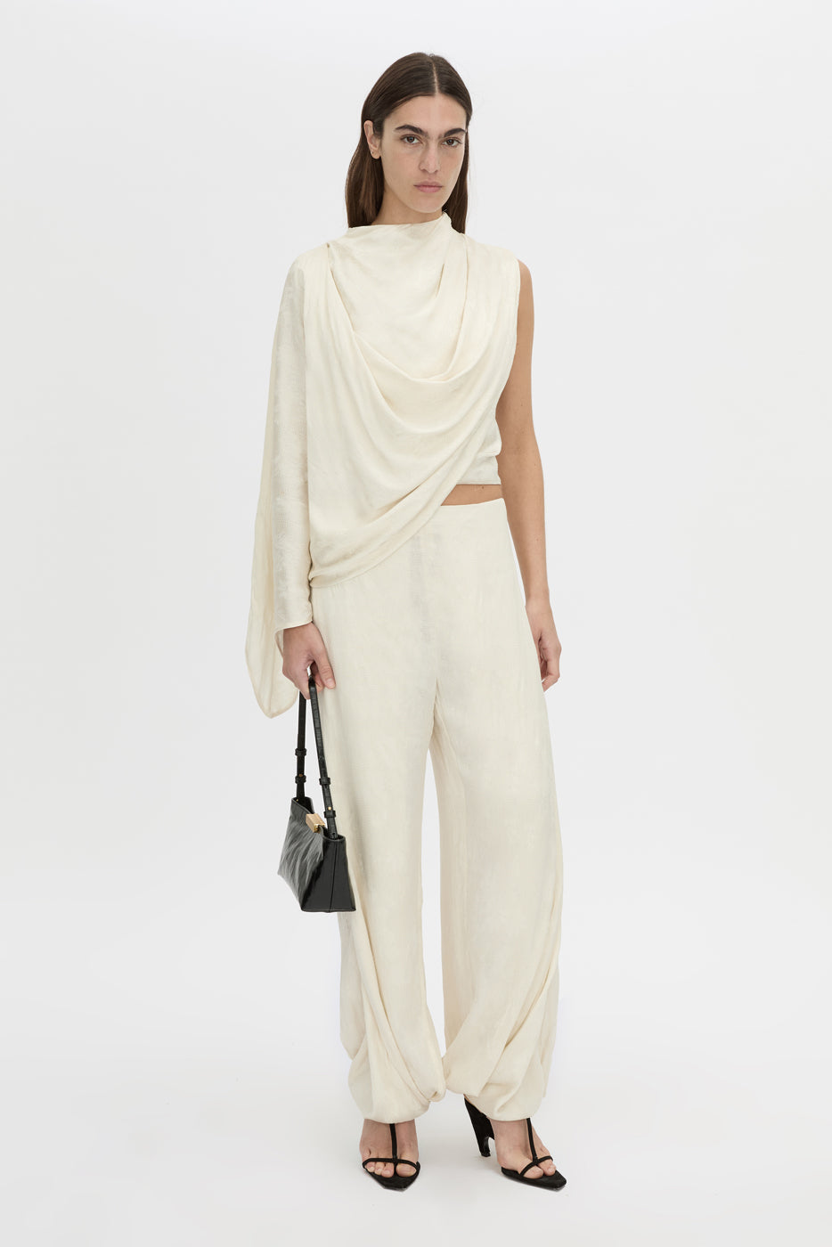 Front-styled view CAMILLA AND MARC Avis Pant in cream with wide-leg balloon design.