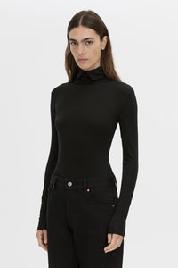 crop view CAMILLA AND MARC Barre turtleneck long sleeve top in black.