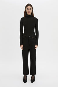 Front view CAMILLA AND MARC Barre turtleneck long sleeve top in black.