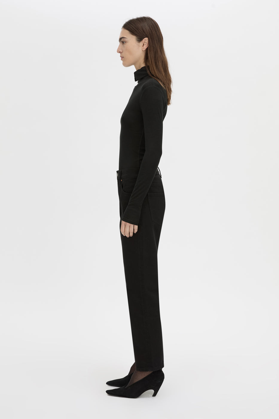 Side view CAMILLA AND MARC Barre turtleneck long sleeve top in black.