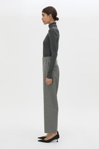Side view CAMILLA AND MARC Barre High Neck Top in Charcoal Grey with long sleeves and V‑neck split turtleneck.