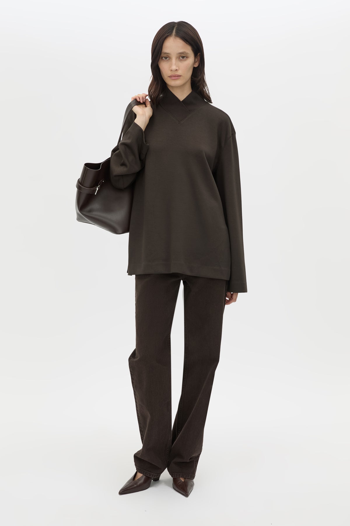 Front view CAMILLA AND MARC Bessette long sleeve top in espresso brown top with high neck. 