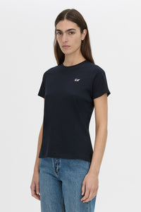 Cropped view CAMILLA AND MARC Birdie Fitted Print Tee in navy with white embroidered motif detail.