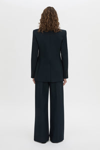 Back view CAMILLA AND MARC Bostan Blazer in a tailored navy fabrication, single-breasted silhouette, sharp shoulder pads, flap welt pockets, chest mock welt pocket, centre back vent and fully lined.