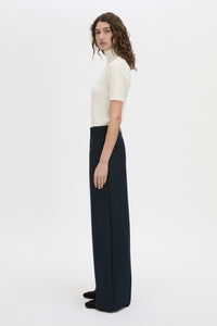 Side view CAMILLA AND MARC Bostan tailored mid-rise pant in navy.