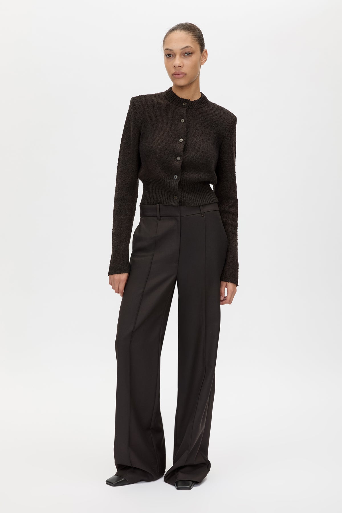 Front view CAMILLA AND MARC Botticino Knit Cardigan in Black and Plum with removable shoulder pads.