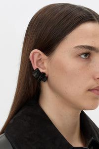 Front-styled view CAMILLA AND MARC Brinna Textured Earrings with gloss black plated finish.