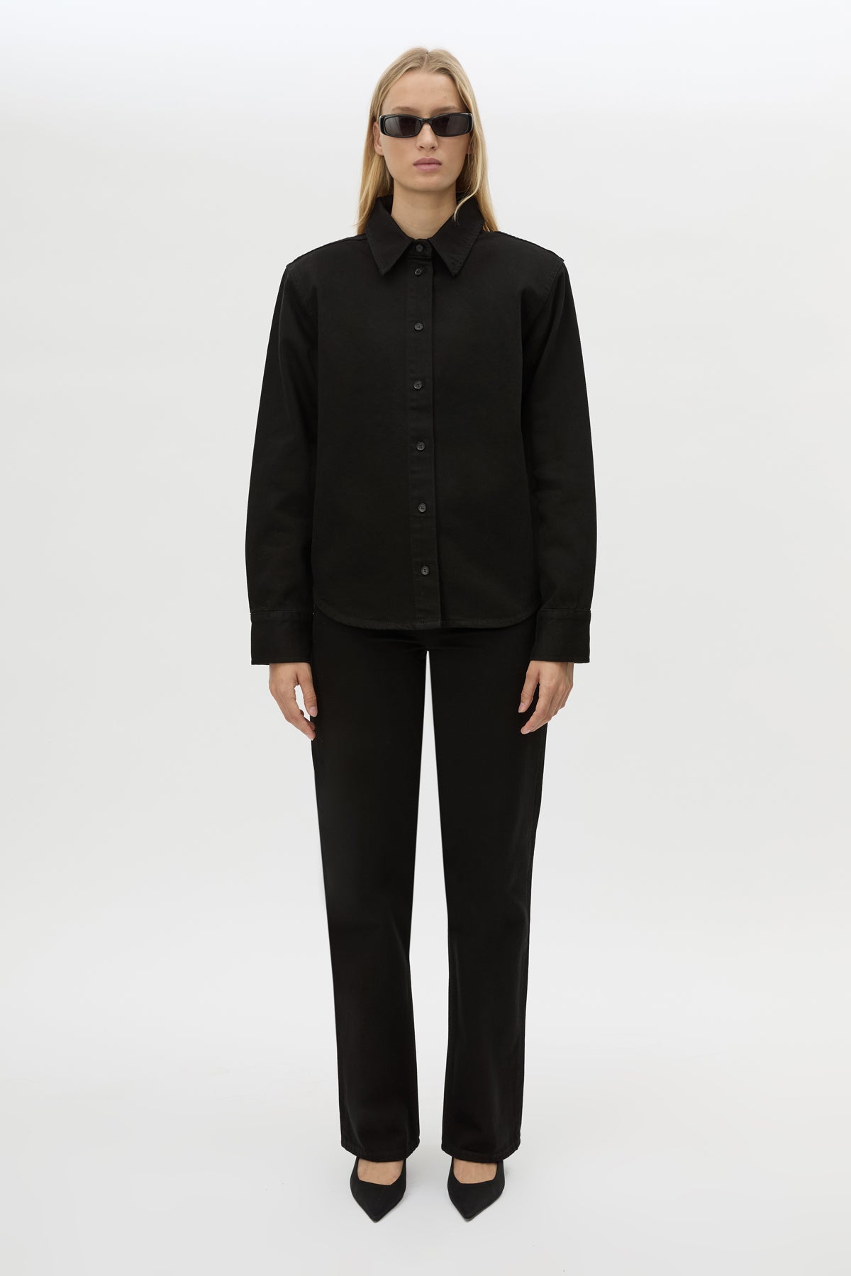 Front styled view CAMILLA AND MARC Caden Denim Shirt in True Black with shoulder pads and embroidered monogram detailing.