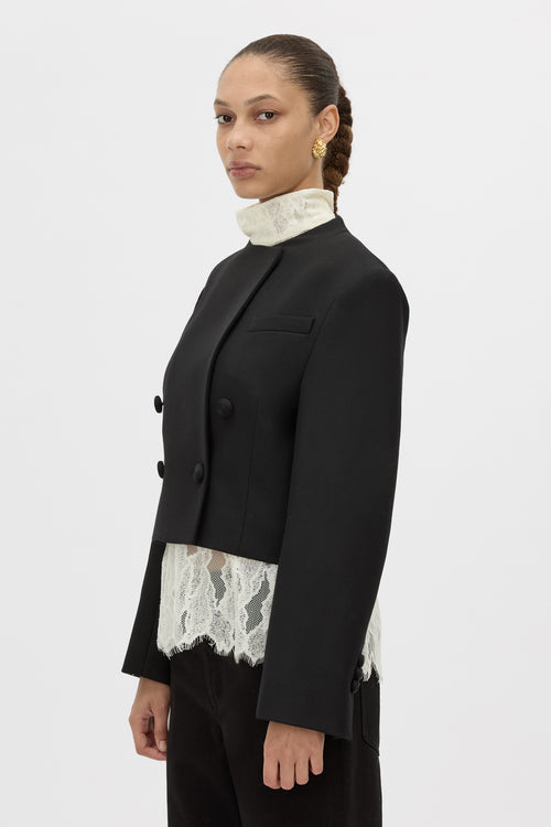 Cropped view CAMILLA AND MARC double-breasted Caius Relaxed Cropped Blazer in black with a collarless neckline.