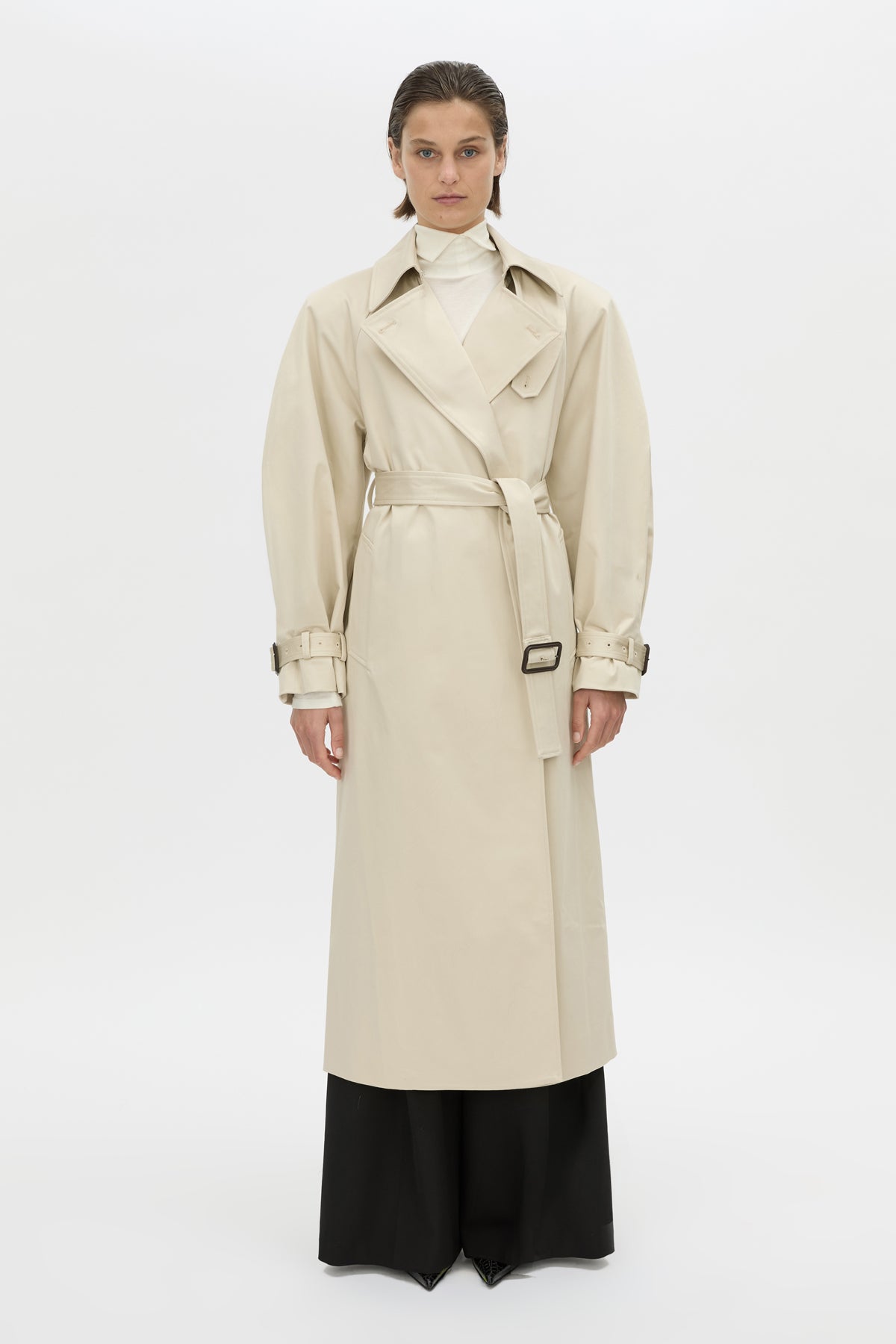 Front view CAMILLA AND MARC Calen Trench Coat in stone with raglan sleeves and removable shoulder pads.