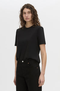Cropped view CAMILLA AND MARC short sleeve Carmen Shoulder Pad Tee in black with strong shoulder design. 