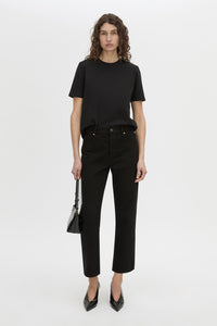 Front view CAMILLA AND MARC short sleeve Carmen Shoulder Pad Tee in black with strong shoulder design. 