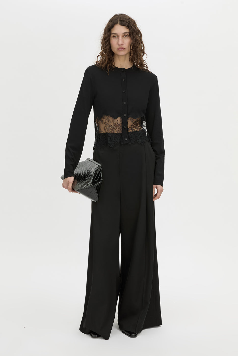 Front-styled view CAMILLA AND MARC Cayana Lace Detail Cardigan in black with scalloped lace hem detail.