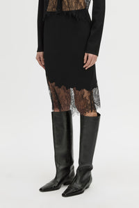 Cropped view CAMILLA AND MARC Cayana Lace Knit Skirt in black with knit knee length design and lace hem detail.