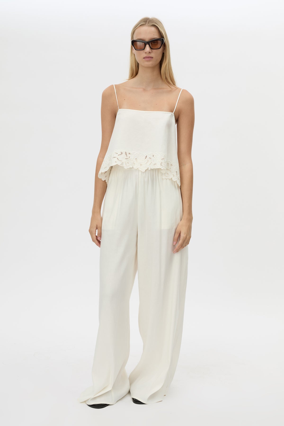 Front view CAMILLA AND MARC Chara Embroidered Cami in Cream with A‑line fit, open back, draped panels and lace hem.