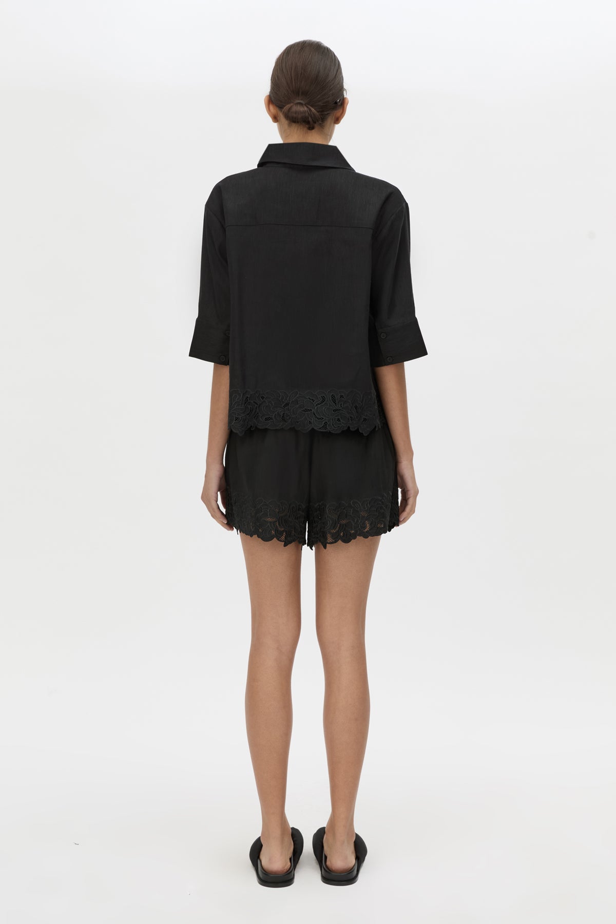 Back view CAMILLA AND MARC Chara Embroidered Cropped Shirt in Black with short sleeves.
