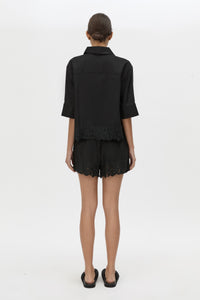 Back view CAMILLA AND MARC Chara Embroidered Short in black with embroidered hem and elasticated waistband.
