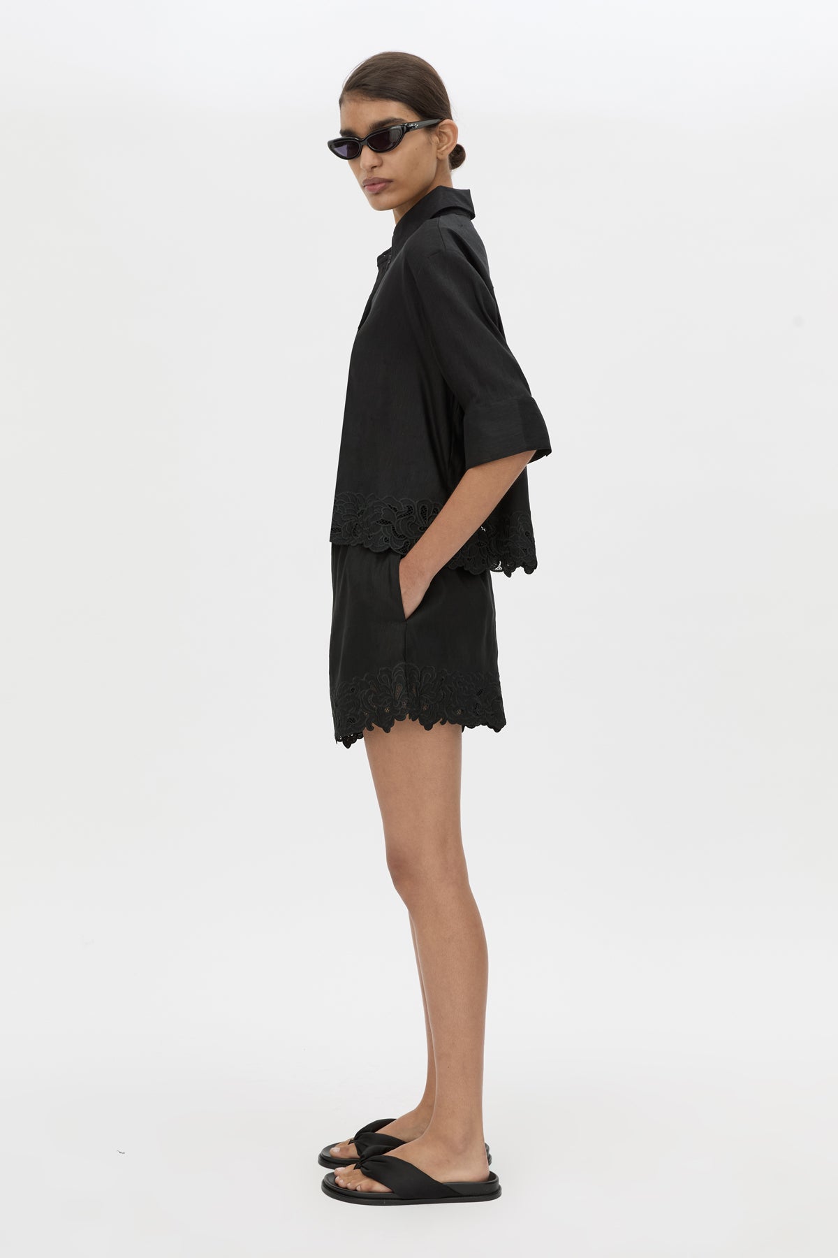 Side view CAMILLA AND MARC Chara Embroidered Short in black with embroidered hem and elasticated waistband.